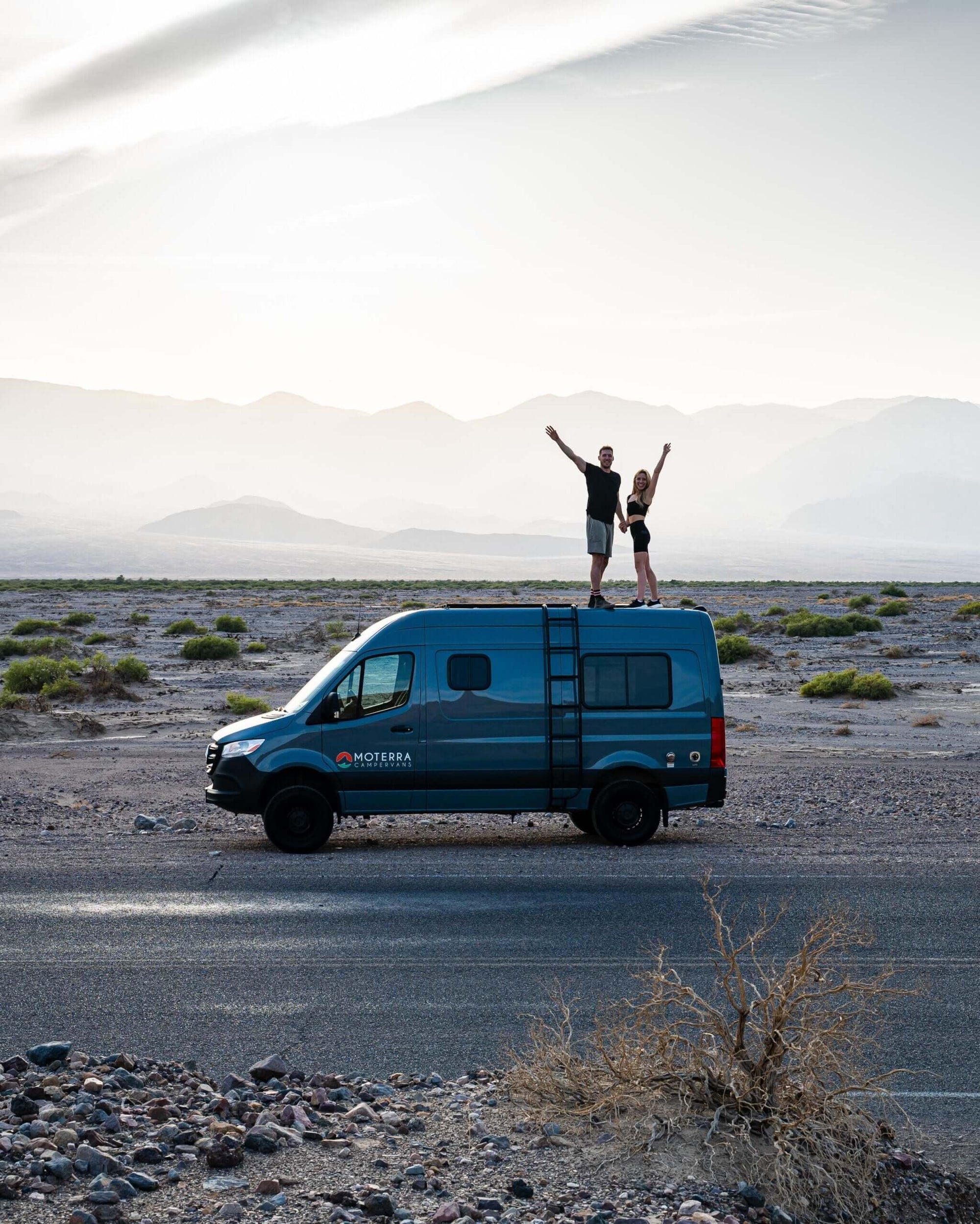 Van lifer embracing the freedom of the road with an open mind, essential for overcoming challenges and enjoying van life.